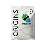 Coffee bag labeled 'Origins Tanzania' with a map and flag design on a dark background